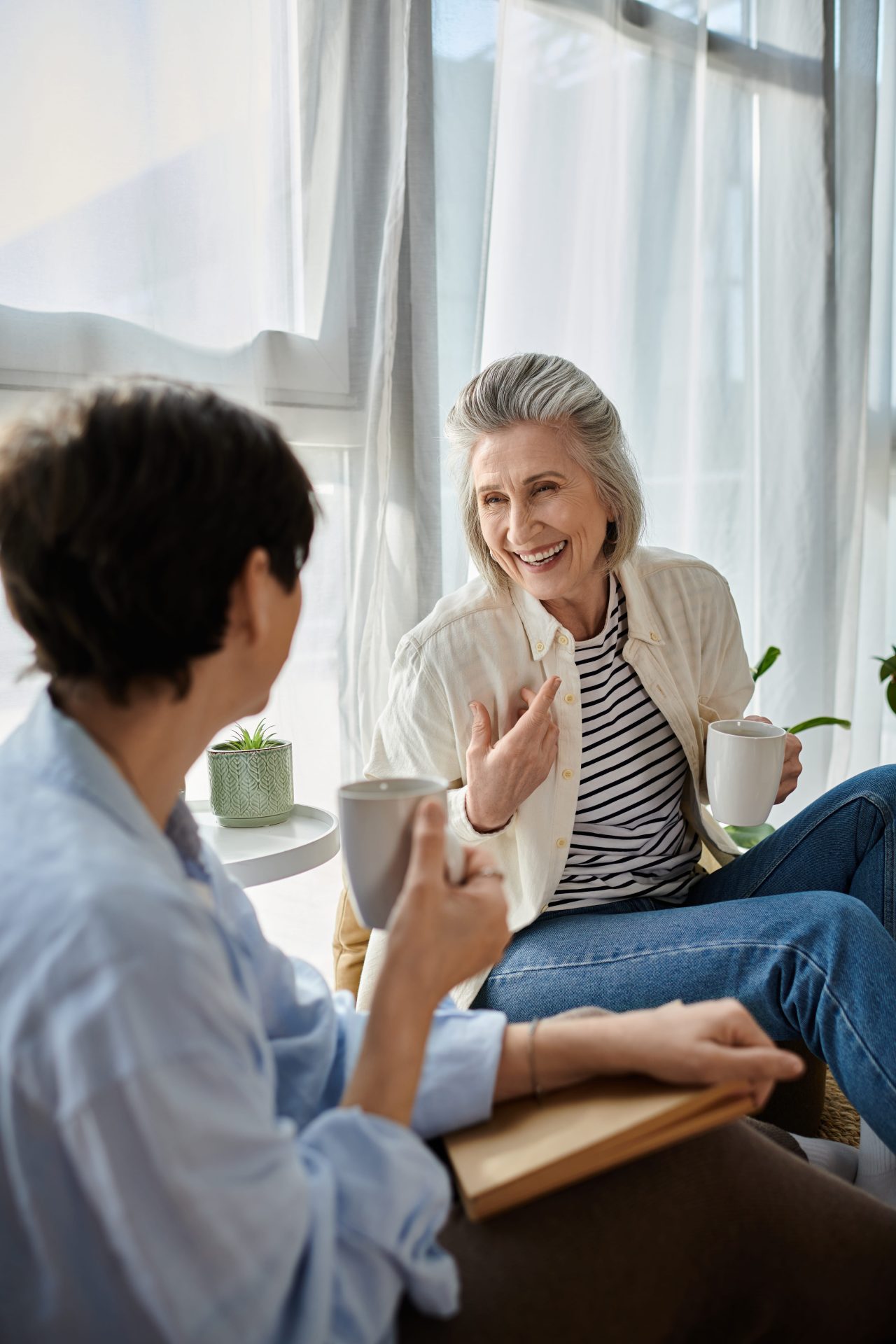 two women having a meaningful conversation while rebuilding trust during recovery